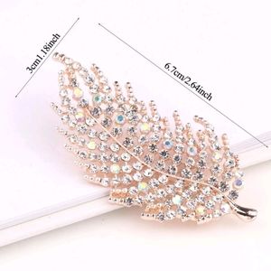 Rhinestone feather shaped broach